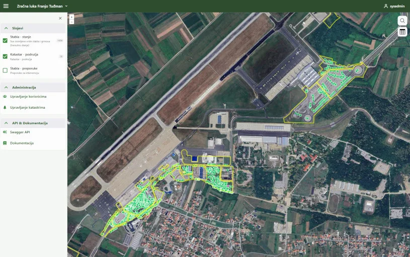 Zeleni katastar map view of Franjo Tuđman Airport on aerial imagery, with green tree inventory points along the terminal apron, yellow cadastre area outlines, and a layer control panel listing recorded tree species, cadastre areas and administration links.